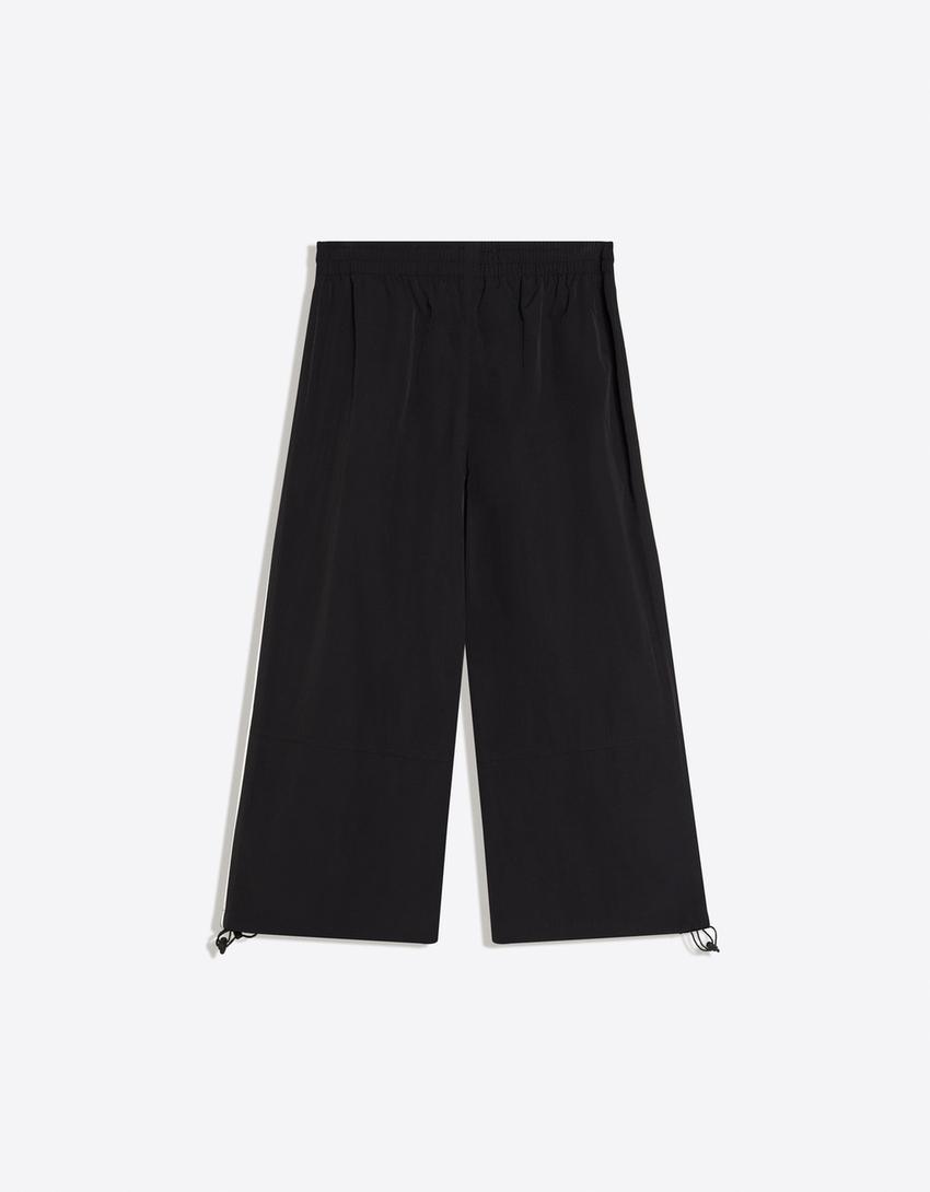 7/8 performance trousers with toggles